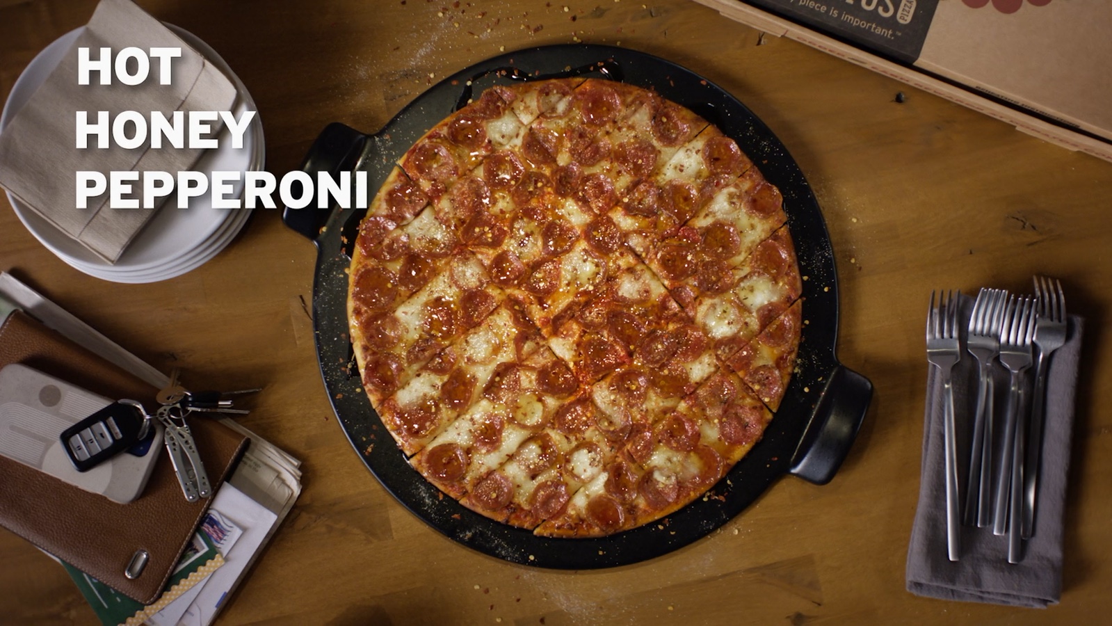 Overhead view of the Hot Honey pizza in the Donatos commercial
