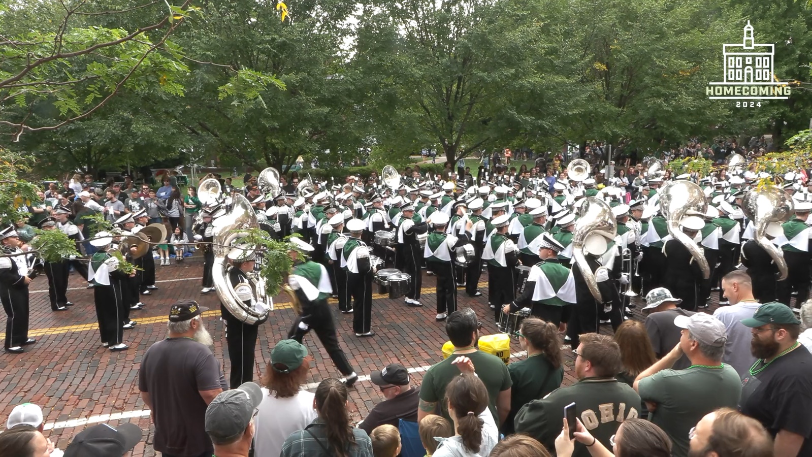 Marching band and spectators at the Ohio University 2024 Homecoming Parade