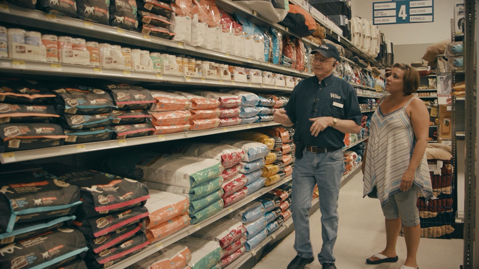 People talking in a retail store in the Purina Mt. Angel dealer spotlight