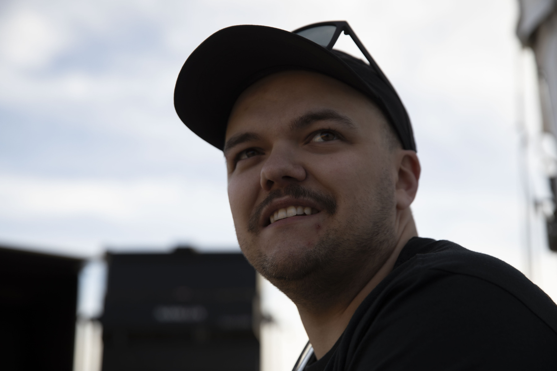 Taylor Tigner outdoors on a production