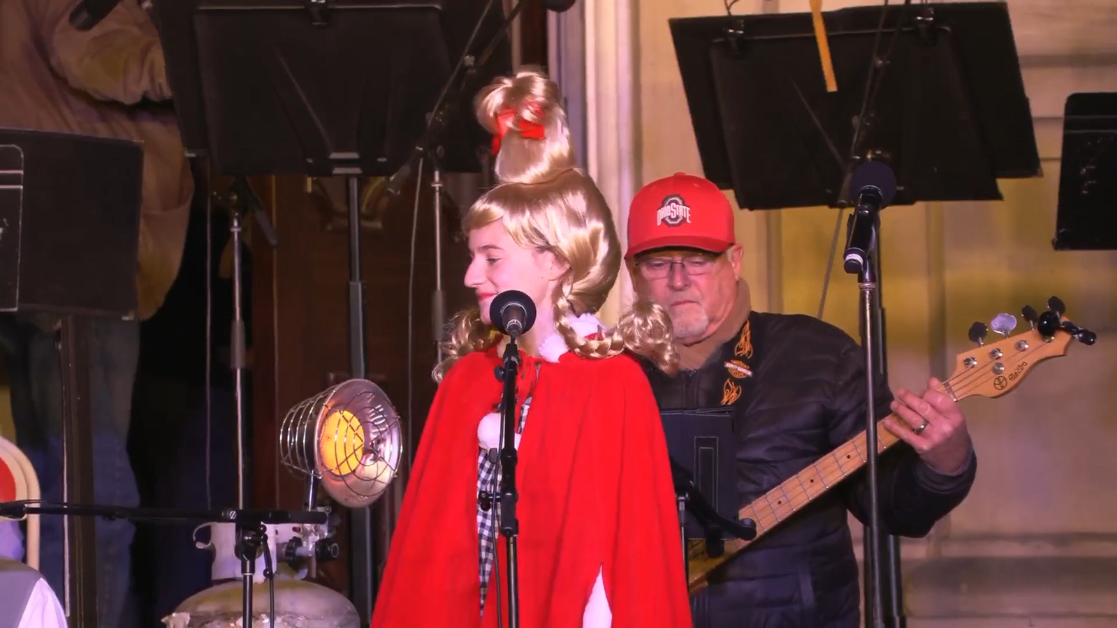 A singer and musicians performing at the courthouse lighting celebration